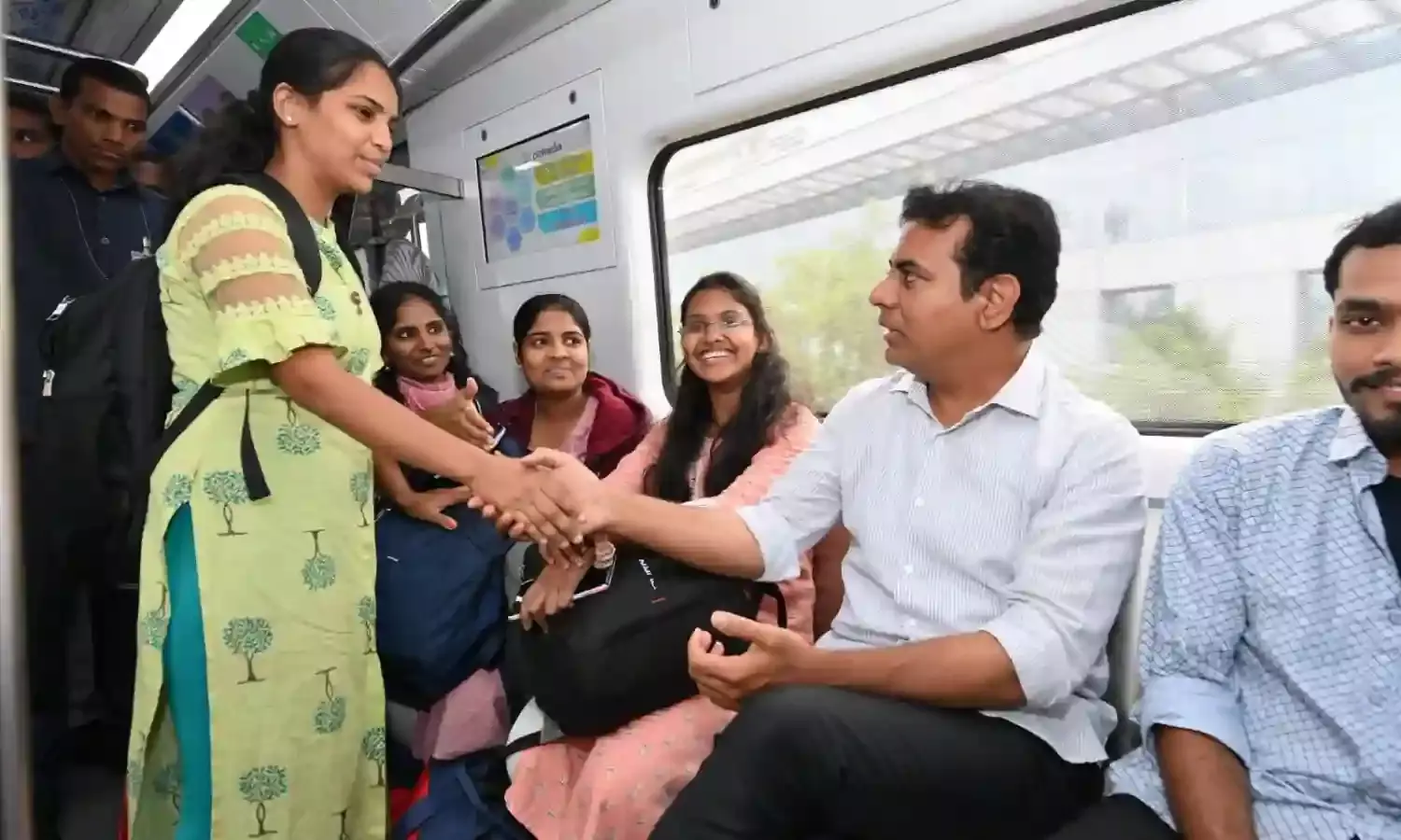KTR travels in Hyderabad Metro, interacts with youth, first-time voters