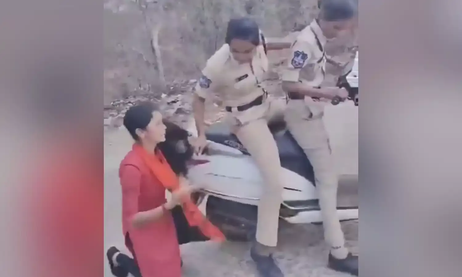 PJTSAU woman, NHRC, woman dragged