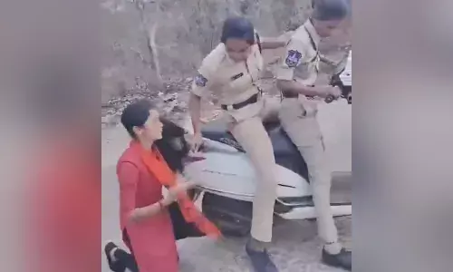 PJTSAU woman, NHRC, woman dragged