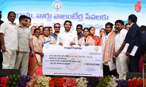 CM Jagan presents cash awards to best village, ward volunteers in AP