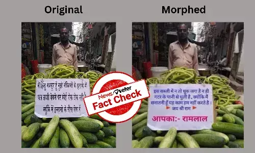 Fact Check: Viral photo of vegetable vendor displaying communally polarising posters is morphed