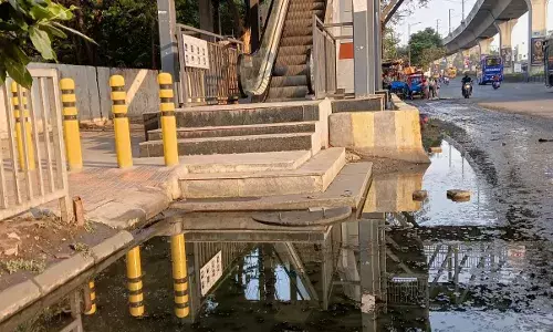 Civic Issue: Stagnant drainage water hinders escalator entry outside Erragadda Hospital