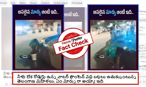 A woman is washing clothes at a water fountain on roadside in Telangana, Video of women washing clothes at water fountain in Telangana