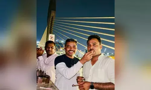 Viral Image: Probe into Madhapur cop in birthday bash on Durgam Cheruvu Bridge