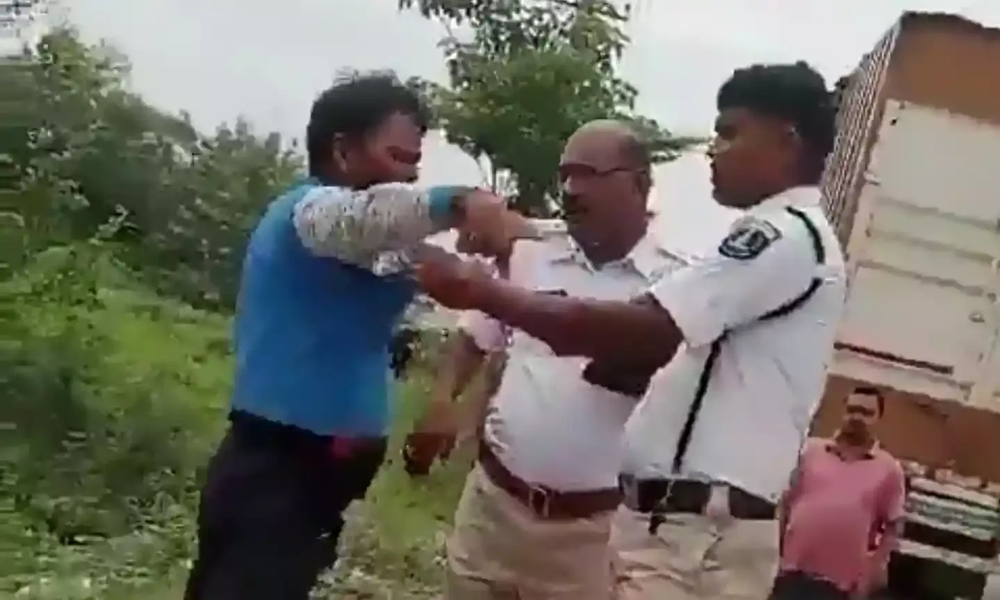 Watch: Jeedimetla traffic SI transferred for slapping truck driver