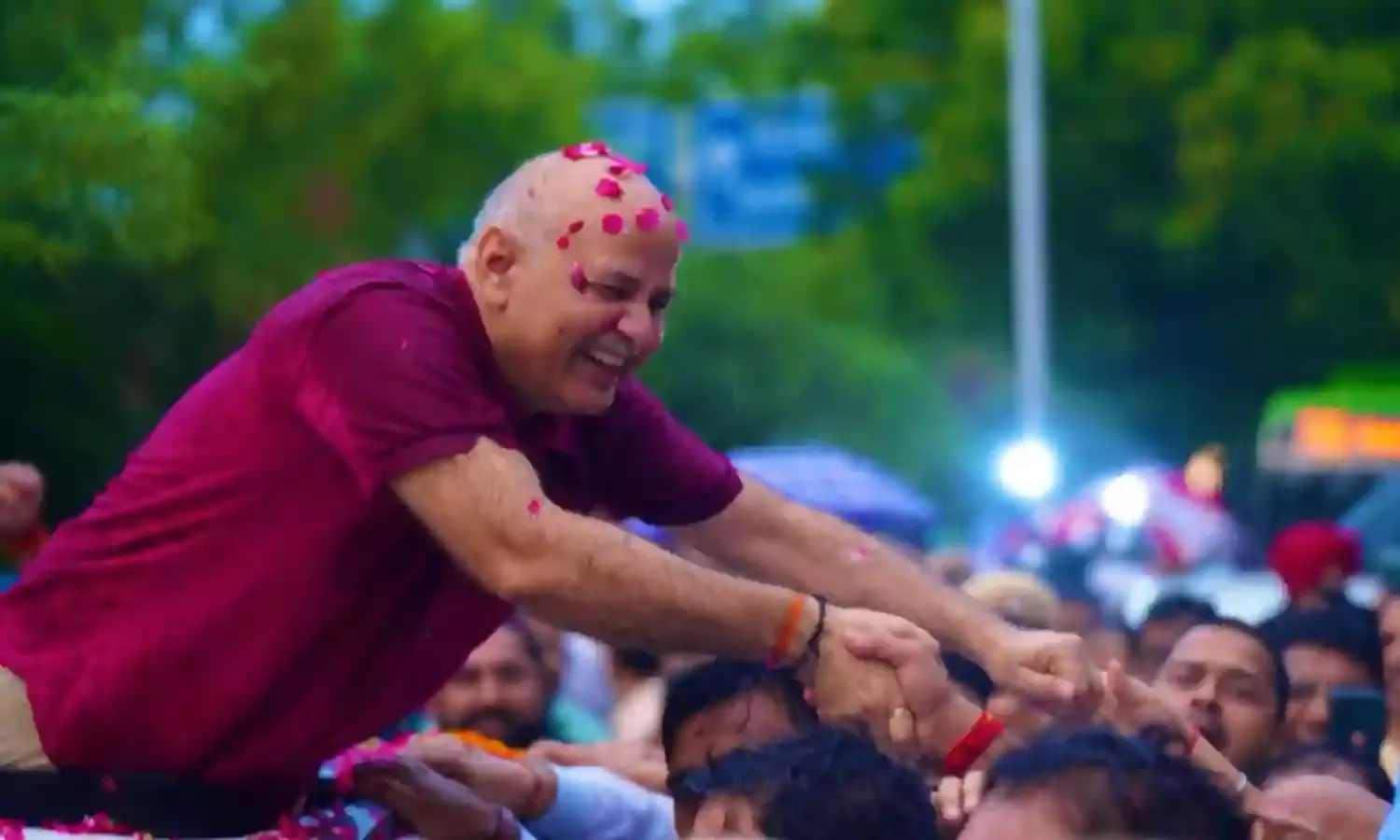 Rain-drenched supporters give Sisodia heros welcome as he walks out of jail after bail