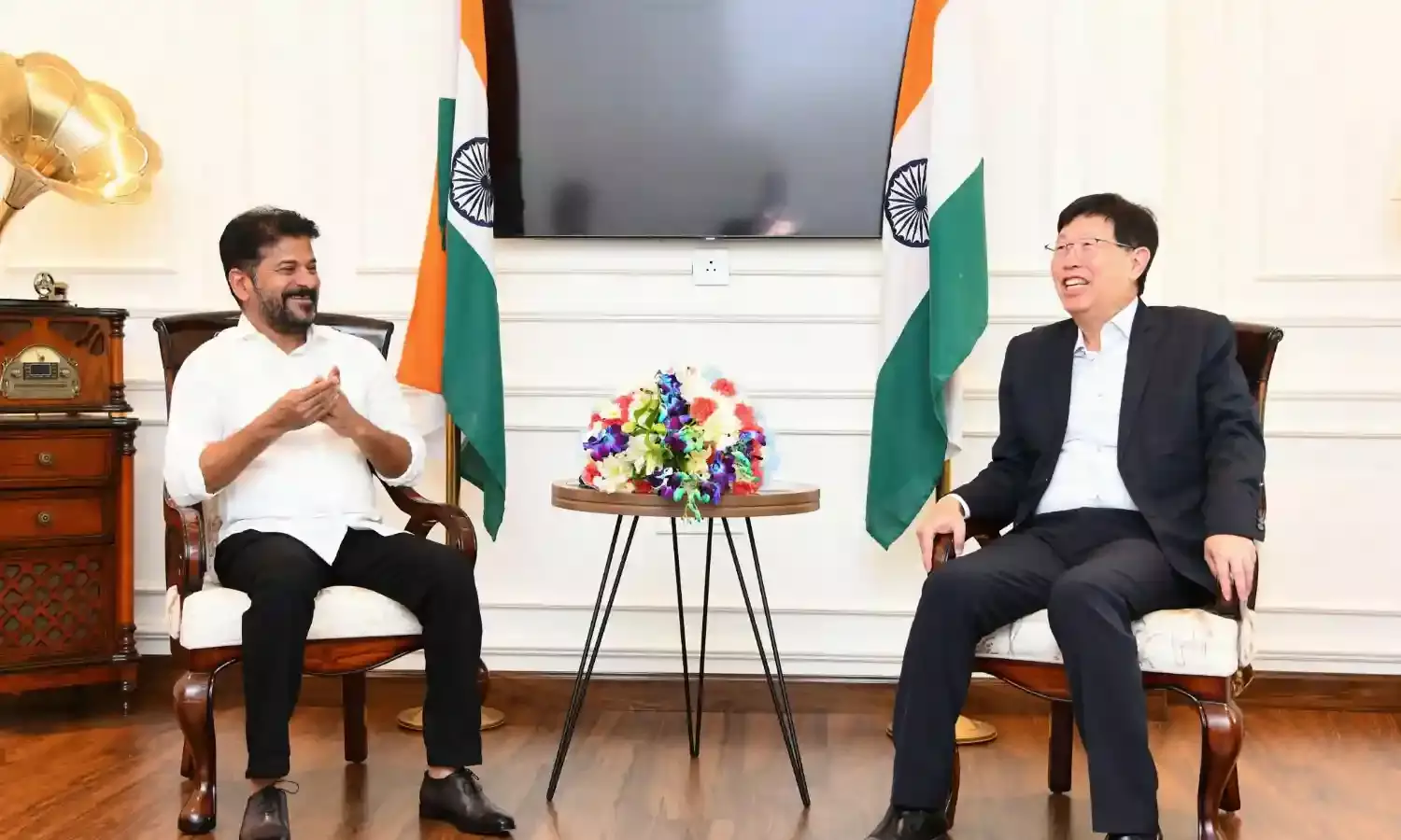 Foxconn chief meets CM Revanth in Delhi, announces visit to Hyderabad
