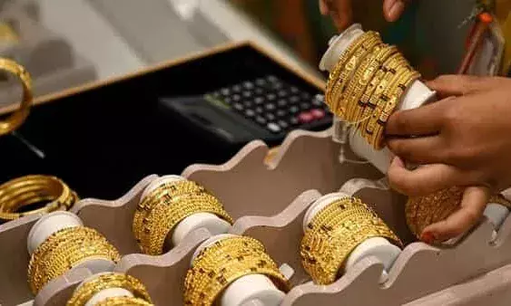 Gold remains flat at Rs 74,150/10g; silver falls Rs 150 per kg