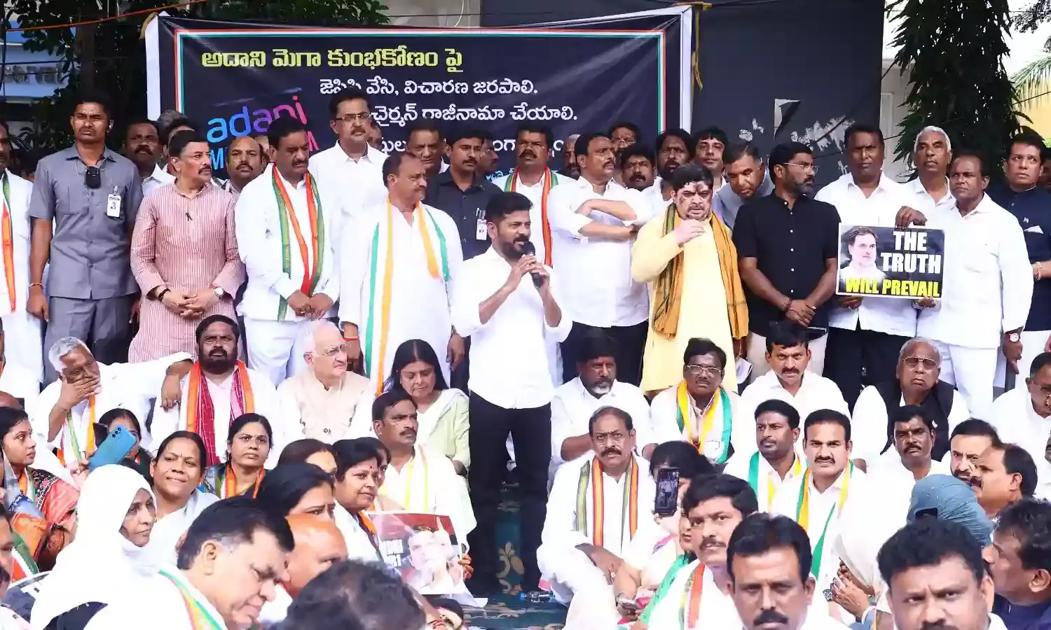Hindenburg report Telangana CM Revanth Reddy Congress leaders protest outside ED office