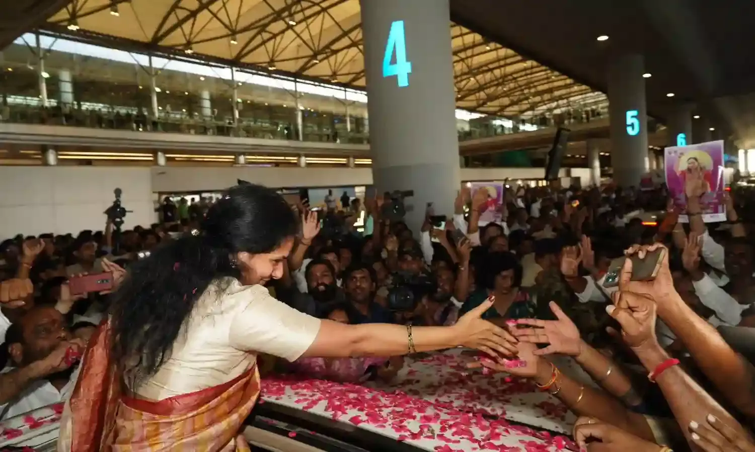 BRS leader Kavitha reaches Hyderabad, gets rousing welcome