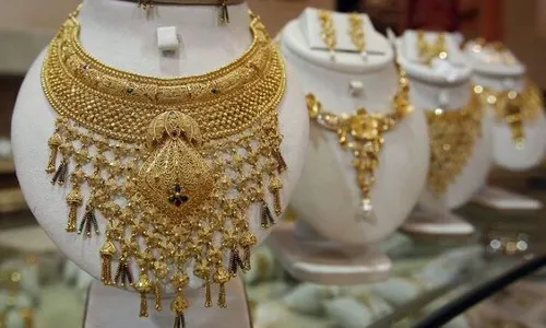 Gold revisits all-time high of Rs 78,700 per 10 grams