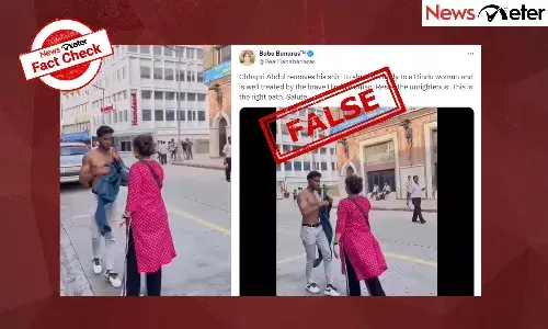 Fact Check: Scripted video of man removing shirt in public shared with communal twist