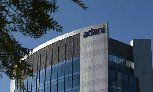 Adani Group firms surge; Adani Total, Adani Power soar nearly 20 pc