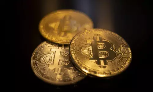 Stock market today: Bitcoin hits $100,000 and Asian shares are mostly higher