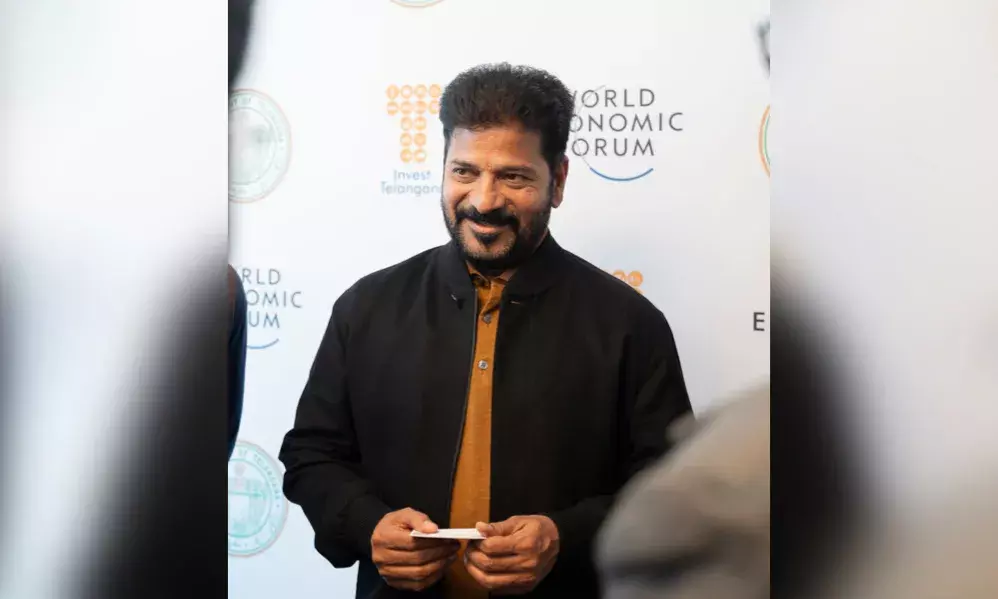 WEF: Telangana inks 3 investment MoUs worth ₹15K Cr with  MEIL at Davos