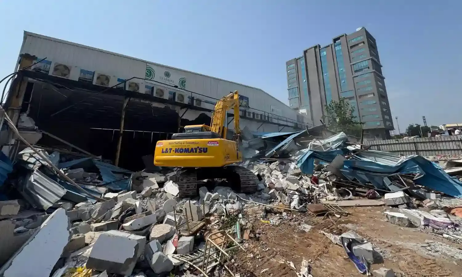 HYDRAA razes unauthorized mini hall, kitchen, restrooms adjacent to Sandhya Convention Center in Gachibowli