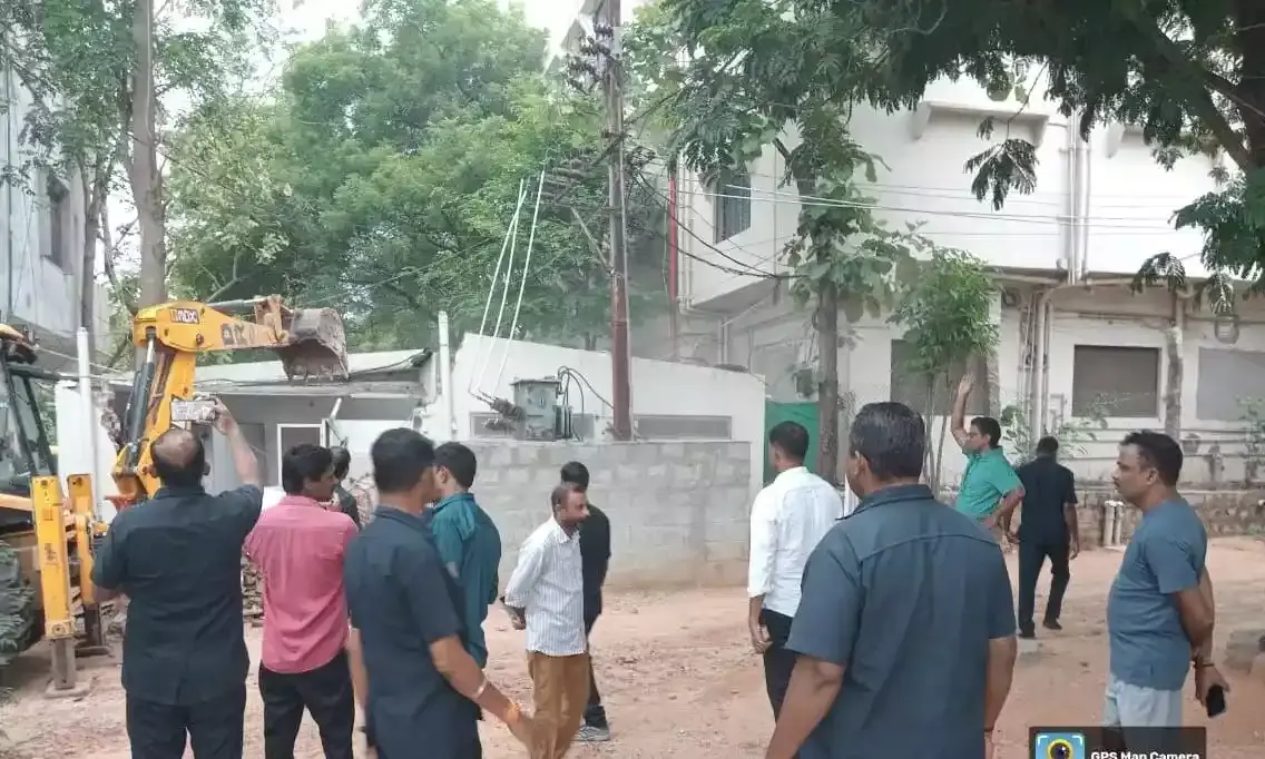 Peerzadiguda: HYDRAA clears road encroachments by school owner who took over road