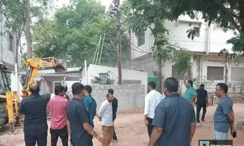 Peerzadiguda: HYDRAA clears road encroachments by school owner who took over road