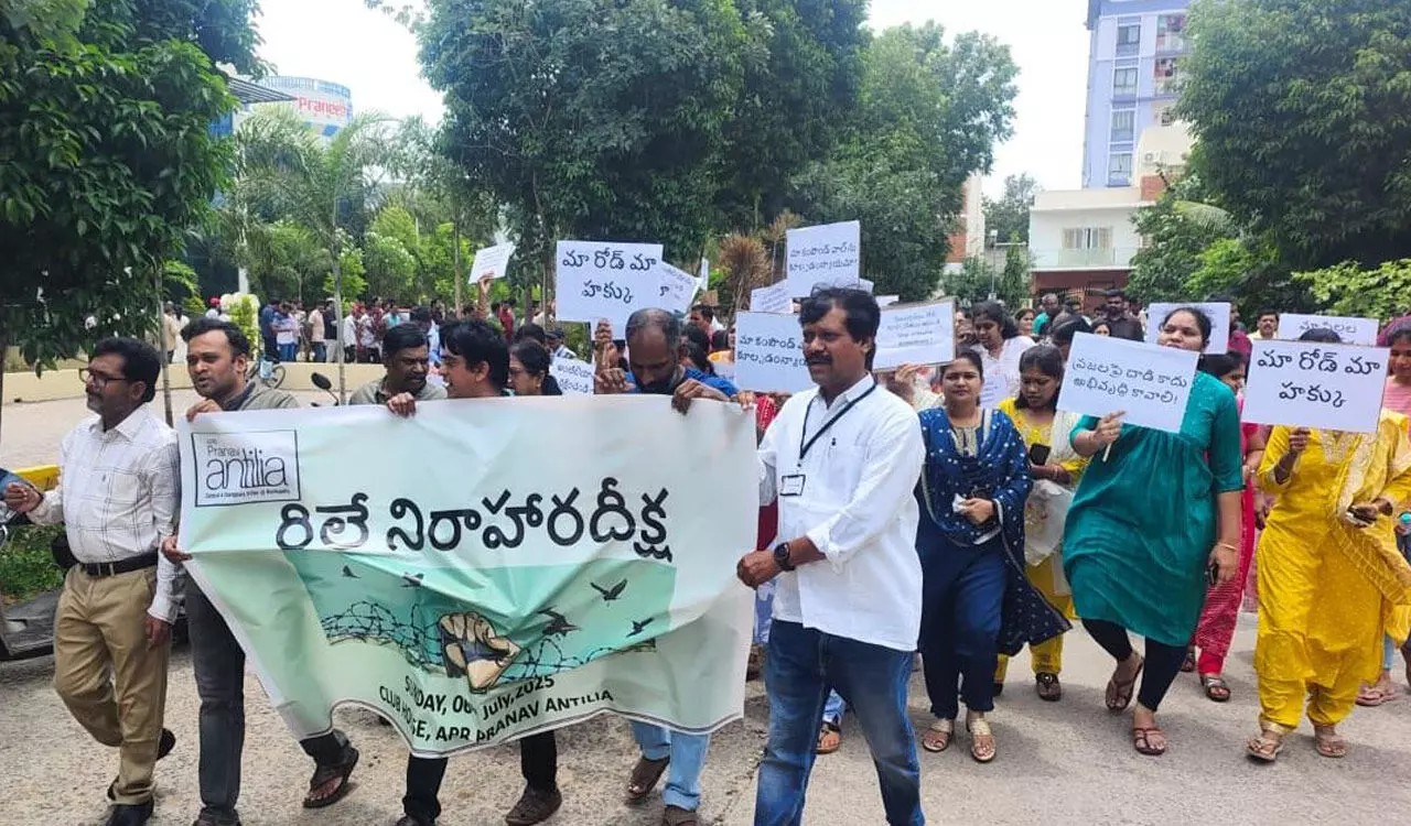 Tension in Bachupally after HYDRAA demolishes boundary wall of Praneeth Antilia; 600 families hit Tension in Bachupally after HYDRAA demolishes boundary wall of Praneeth Antilia; 600 families hit