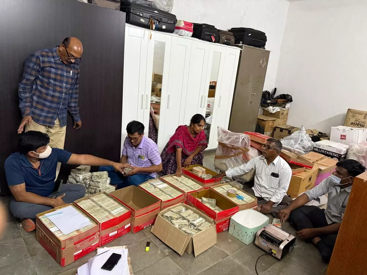 Andhra liquor scam: Investigators recover ₹11 crore cash from cardboard boxes in Sulochana Guest House at Kacharam Andhra liquor scam: Investigators recover ₹11 crore cash from cardboard boxes in Sulochana Guest House at Kacharam