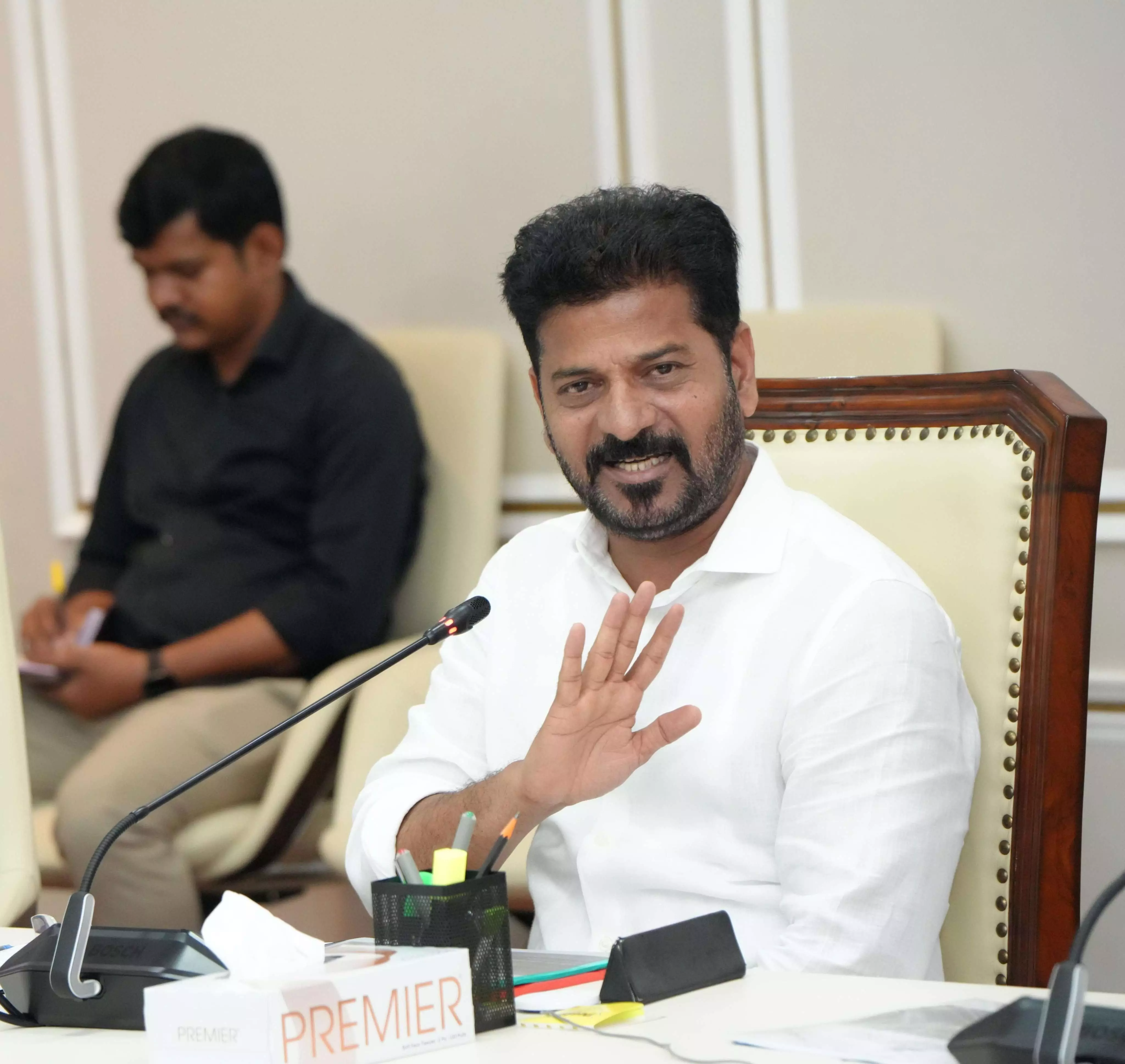 CM Revanth pulls up officials for slow implementation of govt schemes CM Revanth pulls up officials for slow implementation of govt schemes