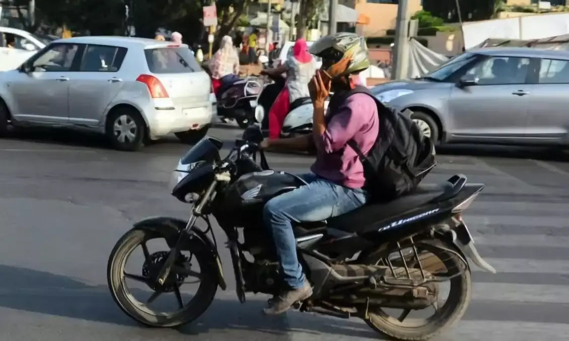 Hyderabad police cracks down on mobile use while driving; 80,555 cases booked this year