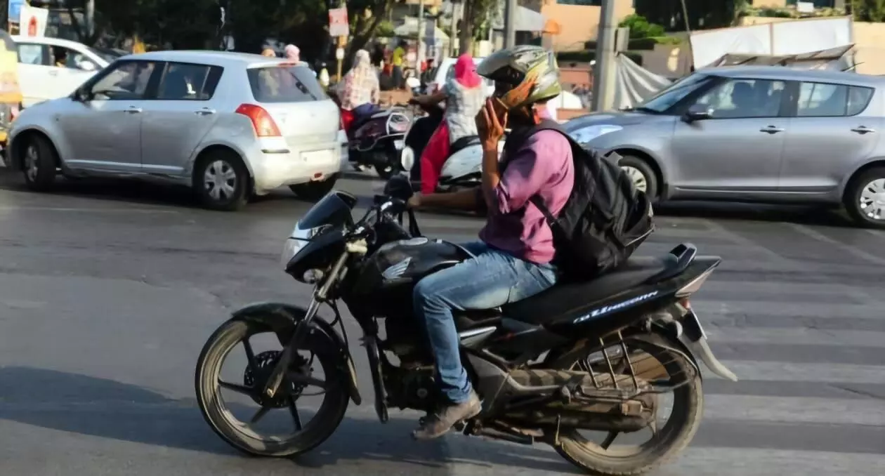 Hyderabad police cracks down on mobile use while driving; 80,555 cases booked this year Hyderabad police cracks down on mobile use while driving; 80,555 cases booked this year
