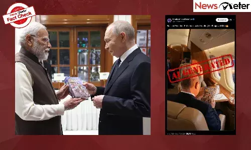 Vladimir Putin reads Bhagavad Gita gifted by Modi on aircraft? No, image is AI-generated Vladimir Putin reads Bhagavad Gita gifted by Modi on aircraft? No, image is AI-generated