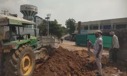 HYDRAA demolishes wall blocking road at Praneeth Antilia, commute reduced by 5 km in Bachupally HYDRAA demolishes wall blocking road at Praneeth Antilia, commute reduced by 5 km in Bachupally