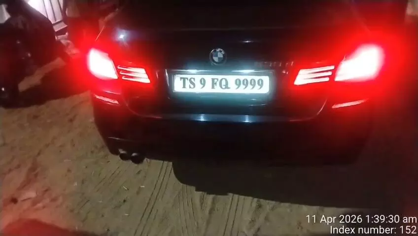 Video: BMW driver installs button to change number plate, caught during Jubilee Hills police check Video: BMW driver installs button to change number plate, caught during Jubilee Hills police check