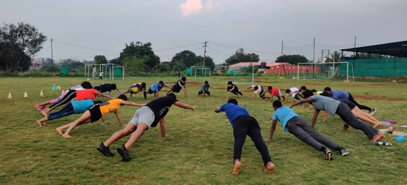 Children exercising at the academy