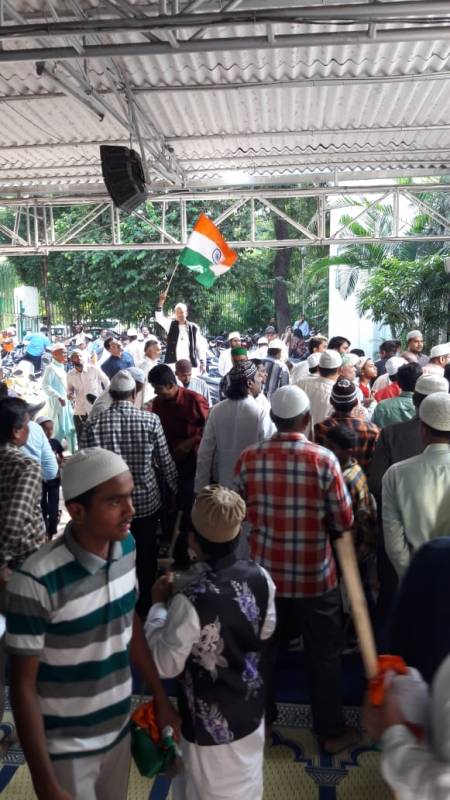 National Flags Distributed At Masjid After Jumma