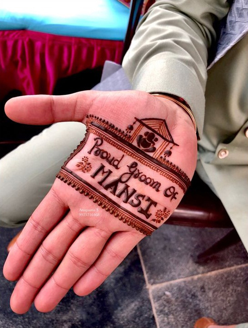 Photo of Floral Mehndi Design with Bride and Groom's Initials